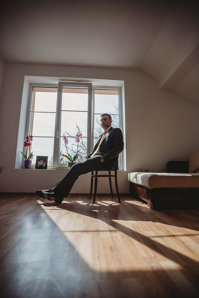 Man apartment sitting