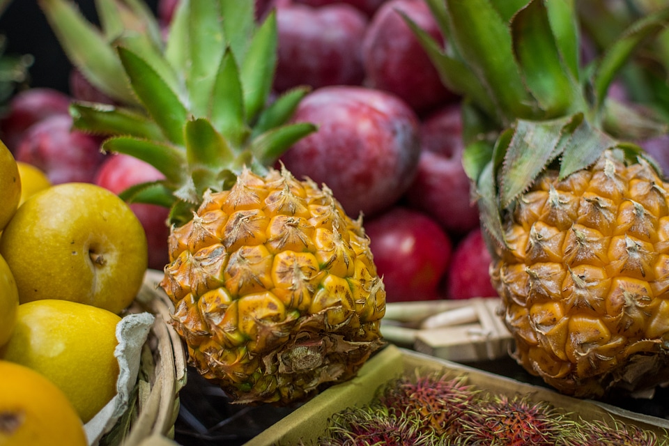 Baby pineapple at a market