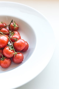 Ripe fresh red cherry tomatoes photo