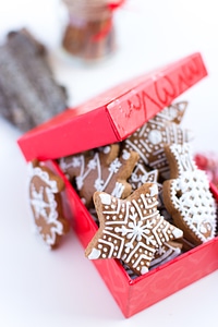 Traditional Christmas gingerbreads in a red paper box photo