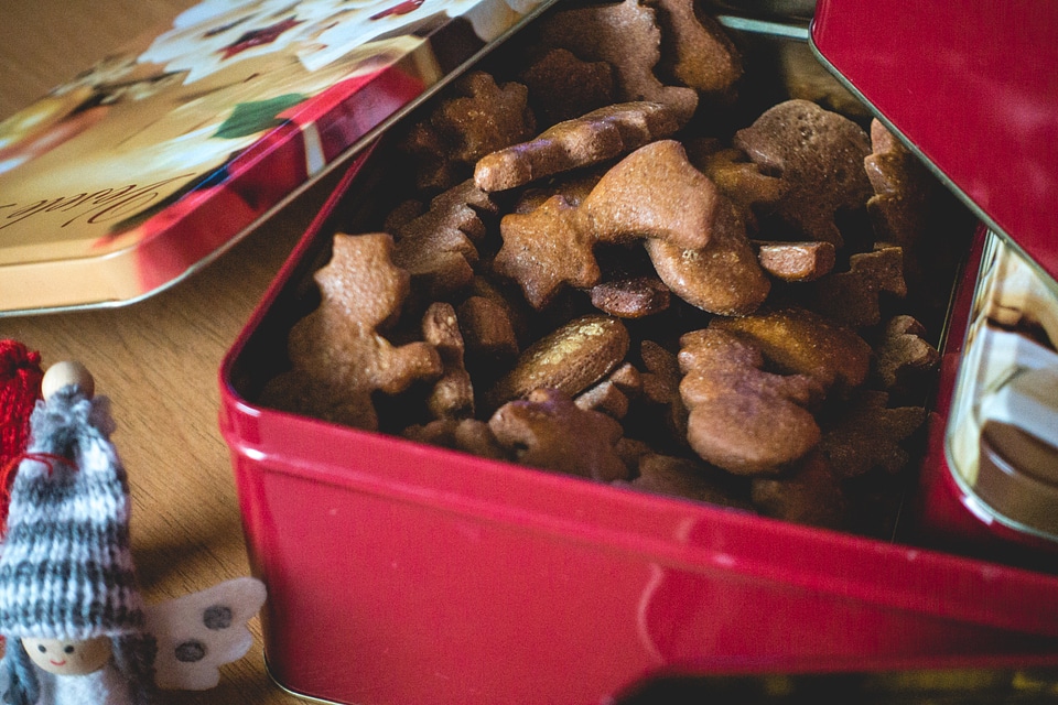 Bunch of traditional Christmas gingerbread with icing in a red box