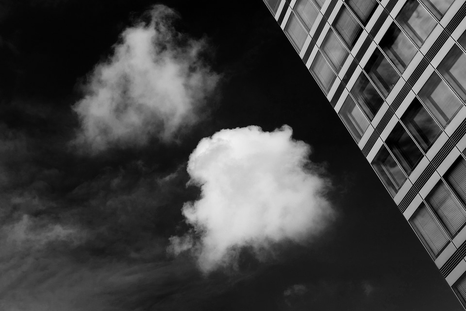 Black and White Abstract Building and Sky photo