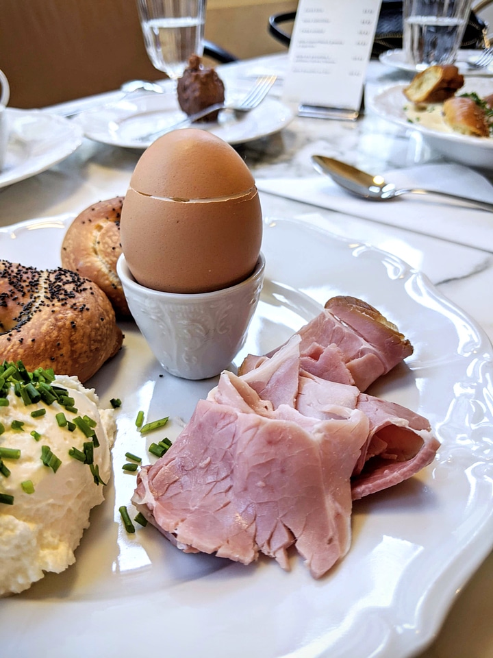 Soft boiled egg with ham for breakfast photo