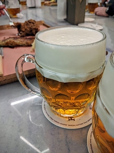 Tapped pilsner beer with a proper foam