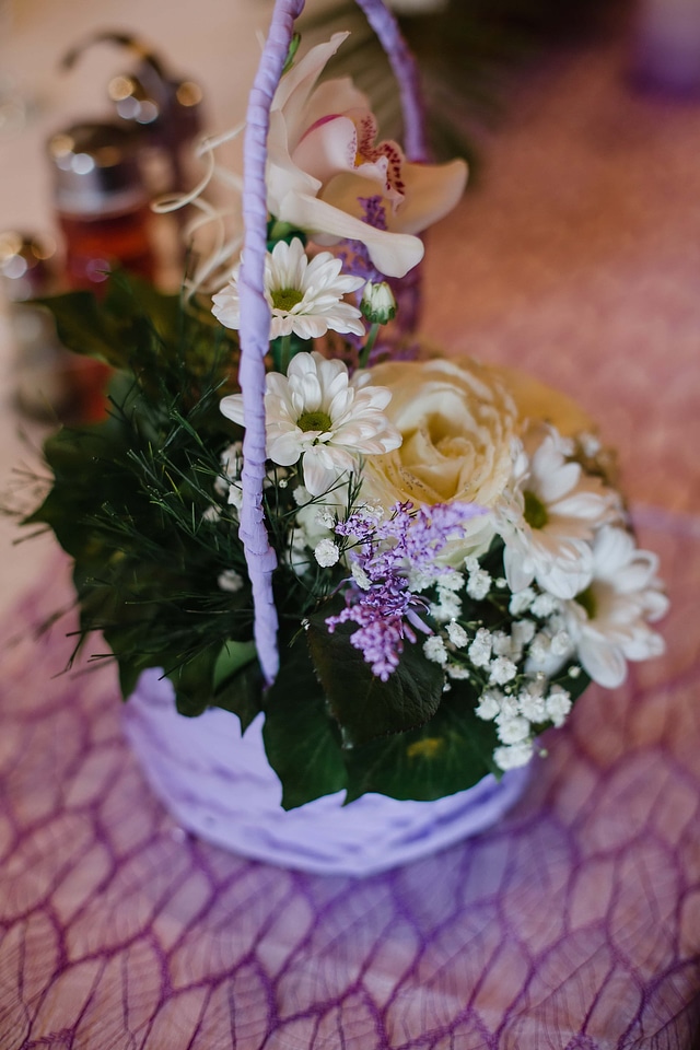 Orchid wicker basket bouquet photo