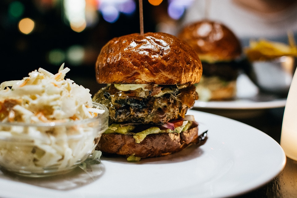 Close up of a juicy beef burger in a restaurant photo