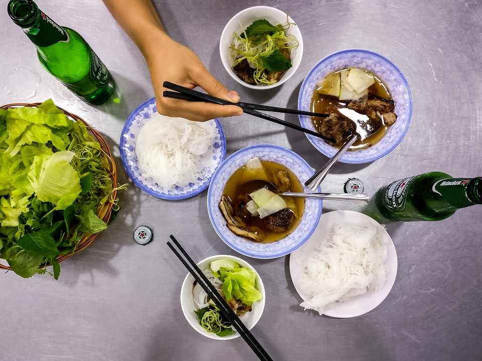 Eating Vietnamese soup with chicken balls
