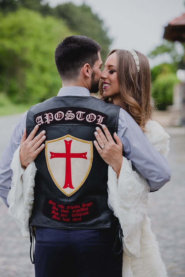 Groom motorcyclist bride