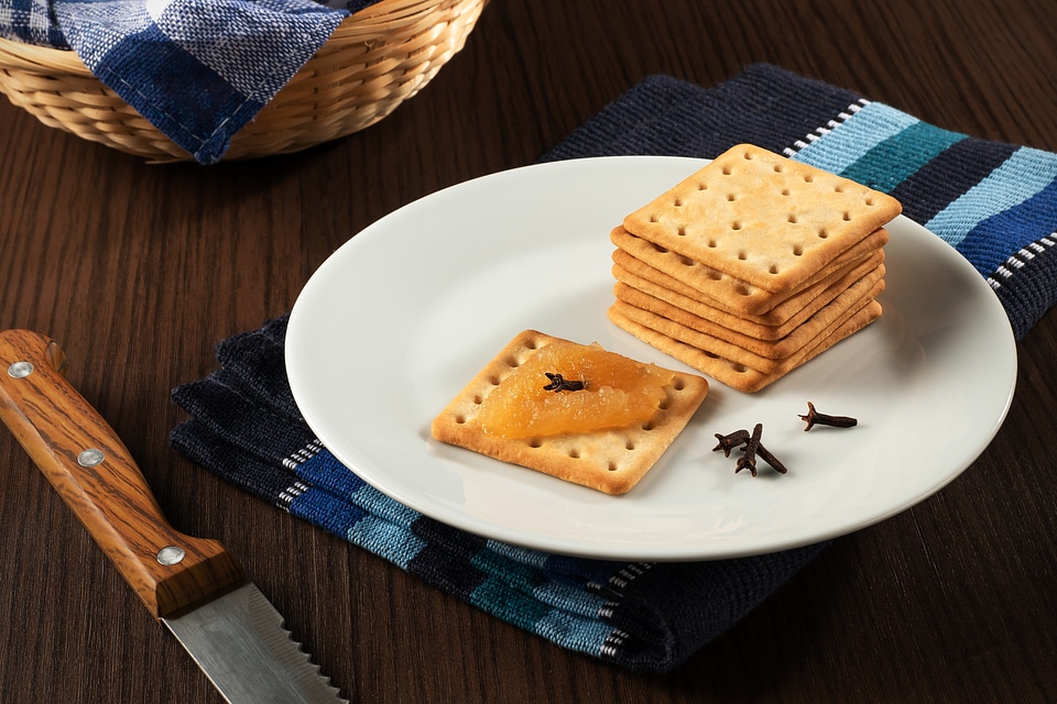 Cream cracker biscuit with apple jam