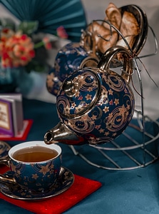 Oriental teapot with a cup photo