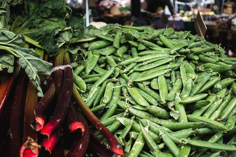 Fresh peas and rhubarb at market