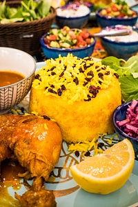 Traditional Iranian saffron rice with raisins photo