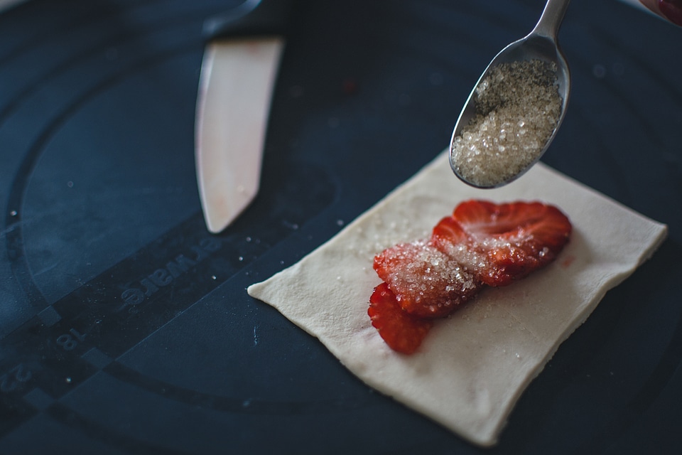 Sugar on sweet strawberry pastry