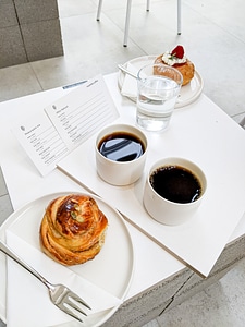 Coffee break with small sweet pastry photo