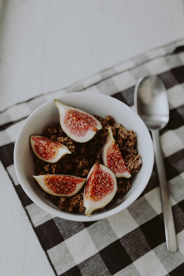 Bowl of crunchy granola and figs