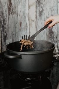 Pasta penne in a boiling water