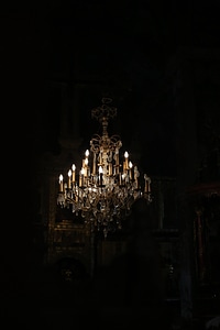 Handling chandelier lights photo