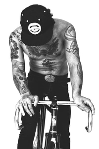 Man with Cool Tattoos on the Bike photo