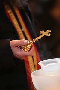 Cross gold priest photo