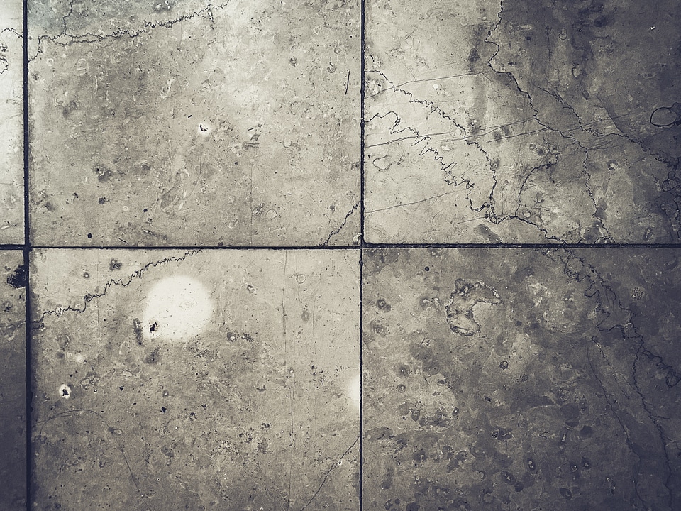 Grunge Grey Tiles on the Floor