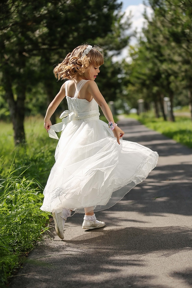 Pretty Girl jumping child photo