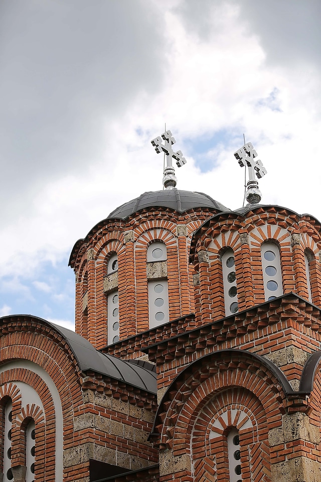 Metallic cross church tower
