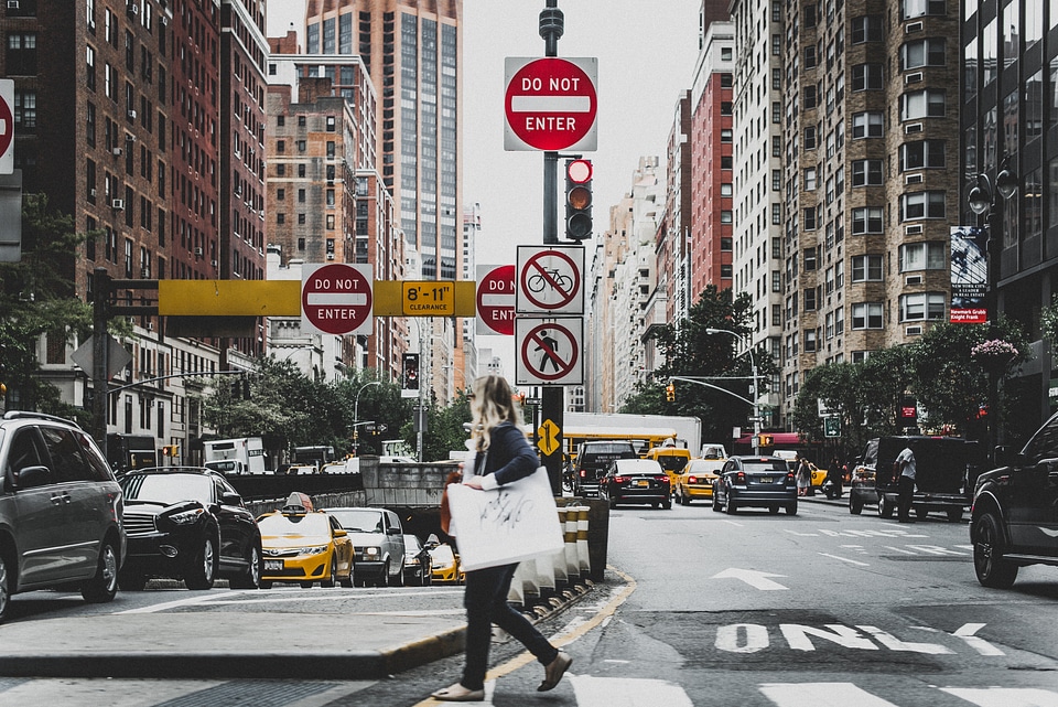 Young Woman Crossing the Street in a New York City photo