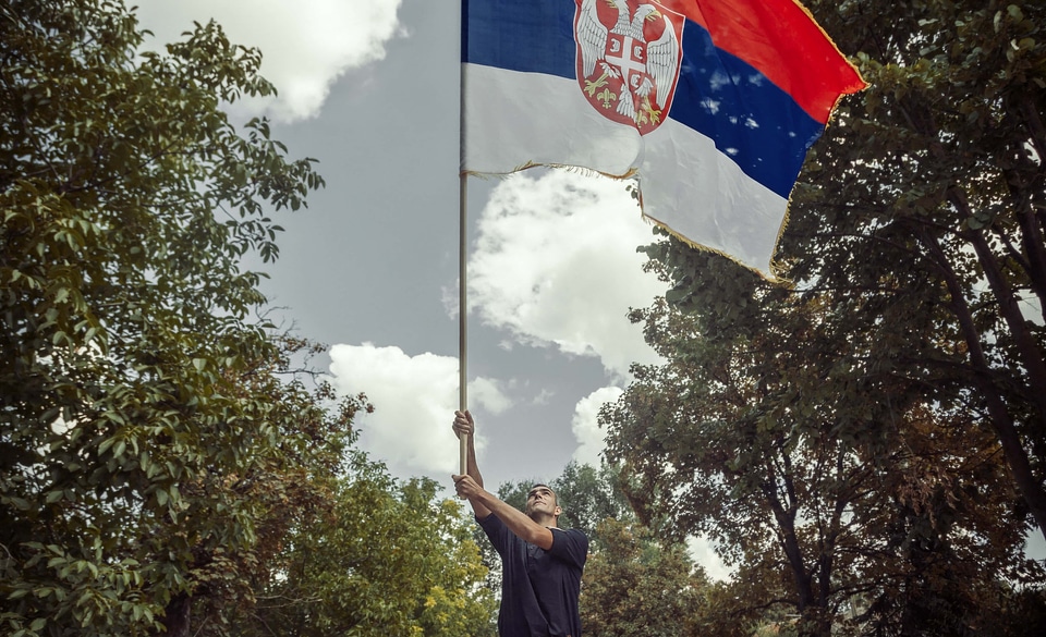 Flag standing Serbia