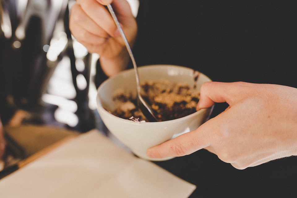 Hands Holding a Breakfast Bowl