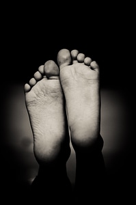Closeup of Barefoot on Black Background photo