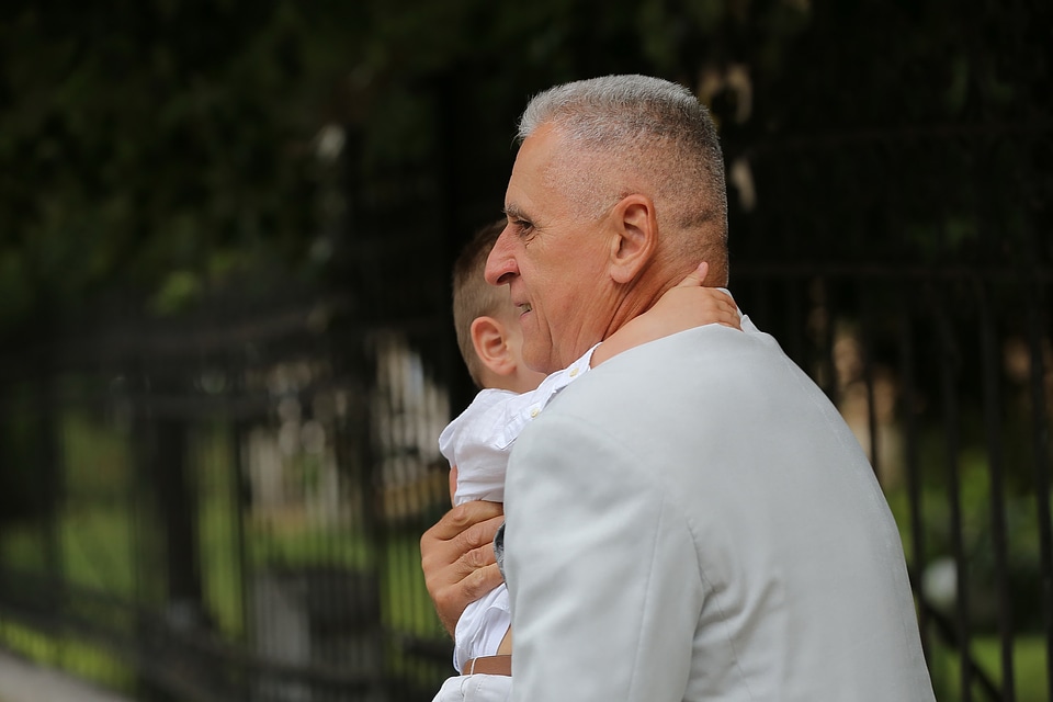 Grandfather grandson embrace