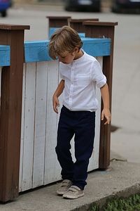 Boy suit walking photo