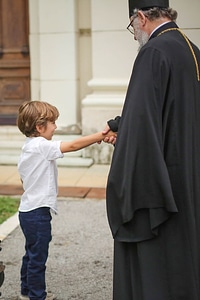 Boys priest meeting