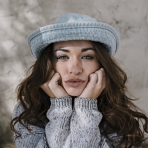 Brunette Wearing Gray Hat photo