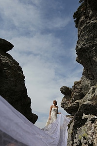 Rocks woman wedding dress photo