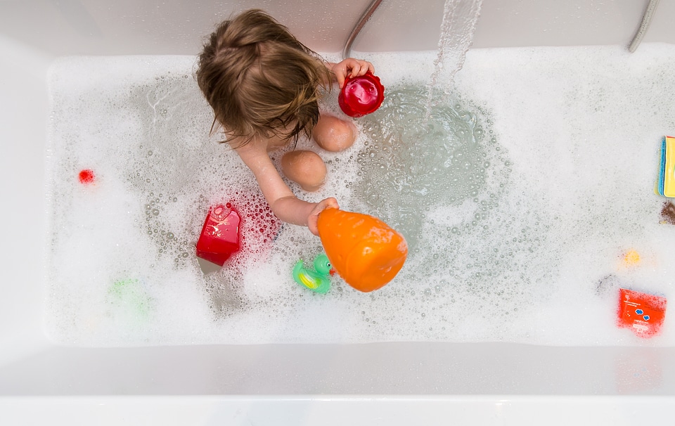 Baby Boy Playing in the Bath