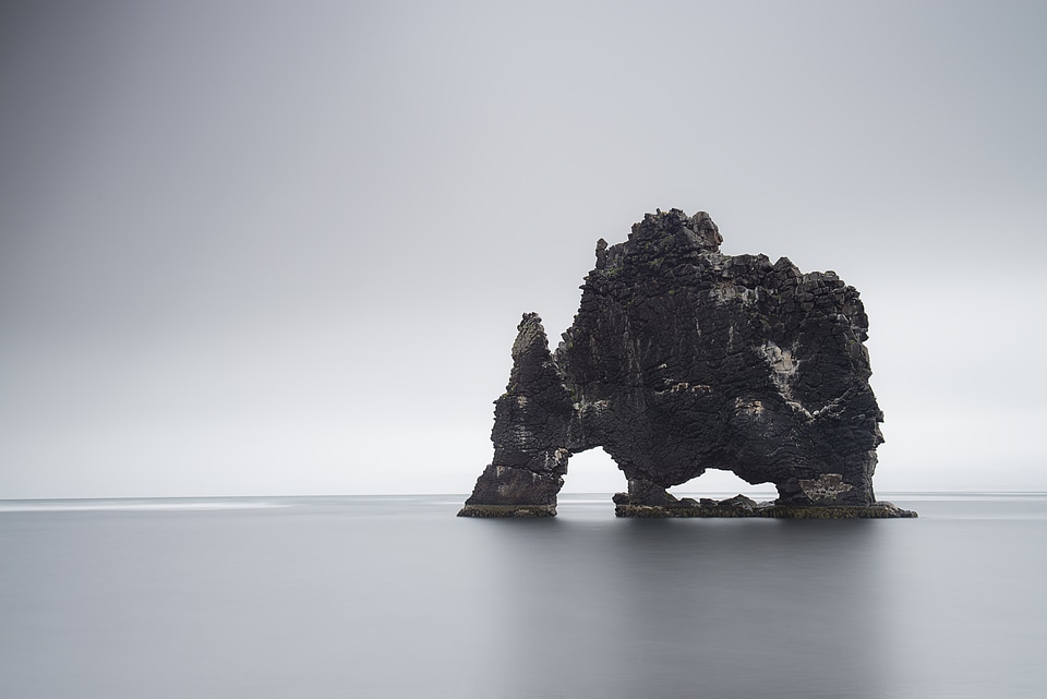 Gray Calm Sea and Island Geology Rock Formation photo