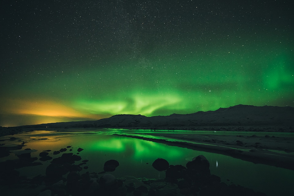 Beautiful Lights Aurora Borealis over Lake photo