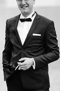 Cigarette smoke tuxedo suit photo