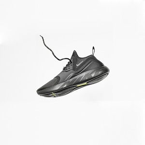 Single Black Nike Sport Shoe Isolated on White Background