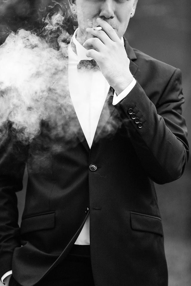 Cigarette smoke tuxedo suit photo