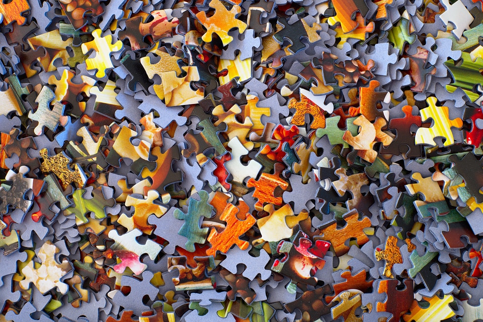 Randomly Scattered Colorful Puzzle Pieces Background photo