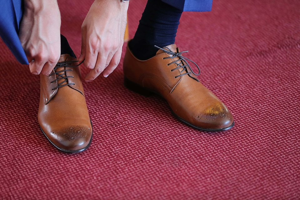 Man shoes shoelace
