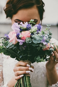 Nice Colorful Wedding Bouquet in Bride's Hand photo