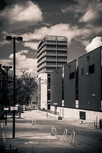 Black & White Photo of Buildings and Parking