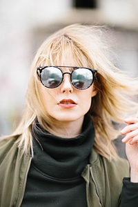 Portrait of Young Beautiful Blonde Girl in Sunglasses photo