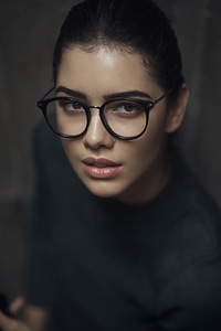 Portrait of Young Woman Wearing Retro Black Glasses photo