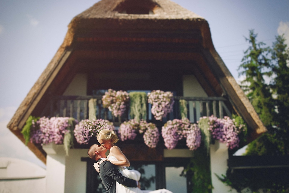 Bride hugging groom