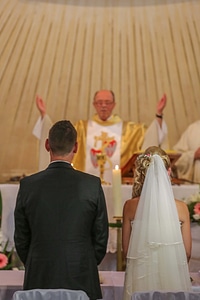 Priest catholic wedding photo