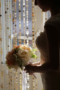 Silhouette bride wedding bouquet
